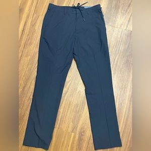 Perry Ellis Slim Stretch navy plaid dress pant with draw string. Slim fit. 29x30